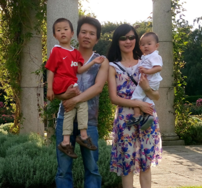 Pastor Min Xing with his wife and sons